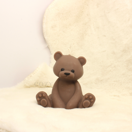  Plush teddy bear in cream, beige, brown, dark brown, black, baby blue, and pink colors. Soft, cuddly, and perfect for decorative or gift purposes.