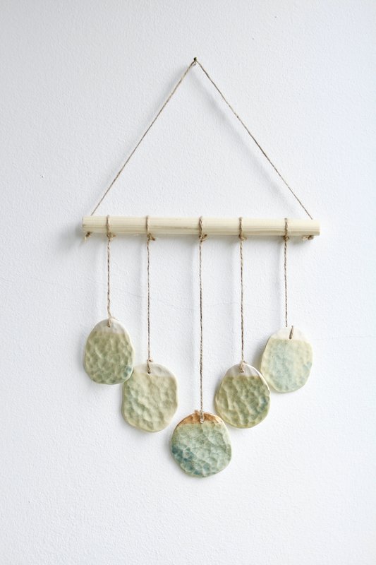 Bohemian wall hanger made of ceramic
