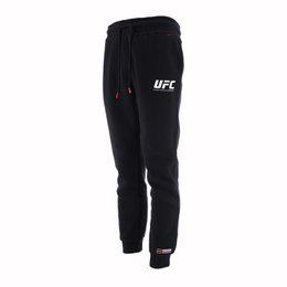  Black UFC branded sweatpants with drawstring waist and pockets, available in sizes S to XXL for men's athletic and casual wear.