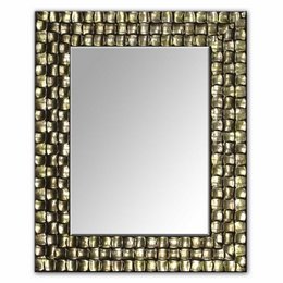  This modern mirror features a champagne-colored frame with a geometric pattern. The mirror is rectangular in shape and available in multiple sizes, making it suitable for various wall spaces. The mirror would complement a variety of home decor styles.