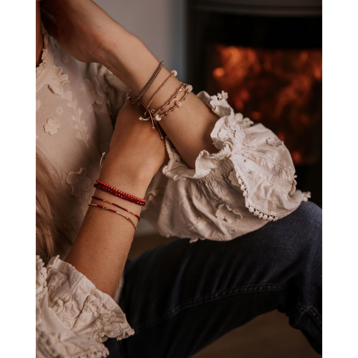 gold bracelet with red