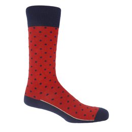 Red and navy blue polka dot socks for men. Made of cotton blend material. Suitable for casual or formal wear.