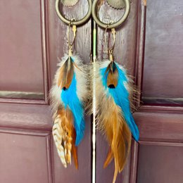 Boucles d'oreilles BOHO avec longues plumes