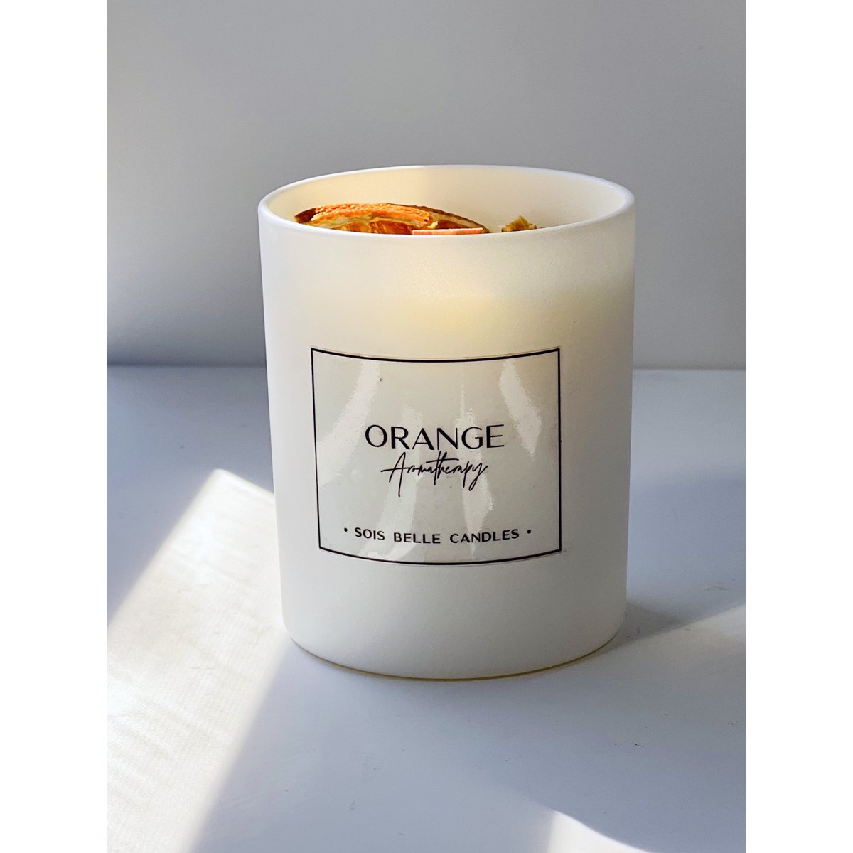 Orange aromatherapy candle