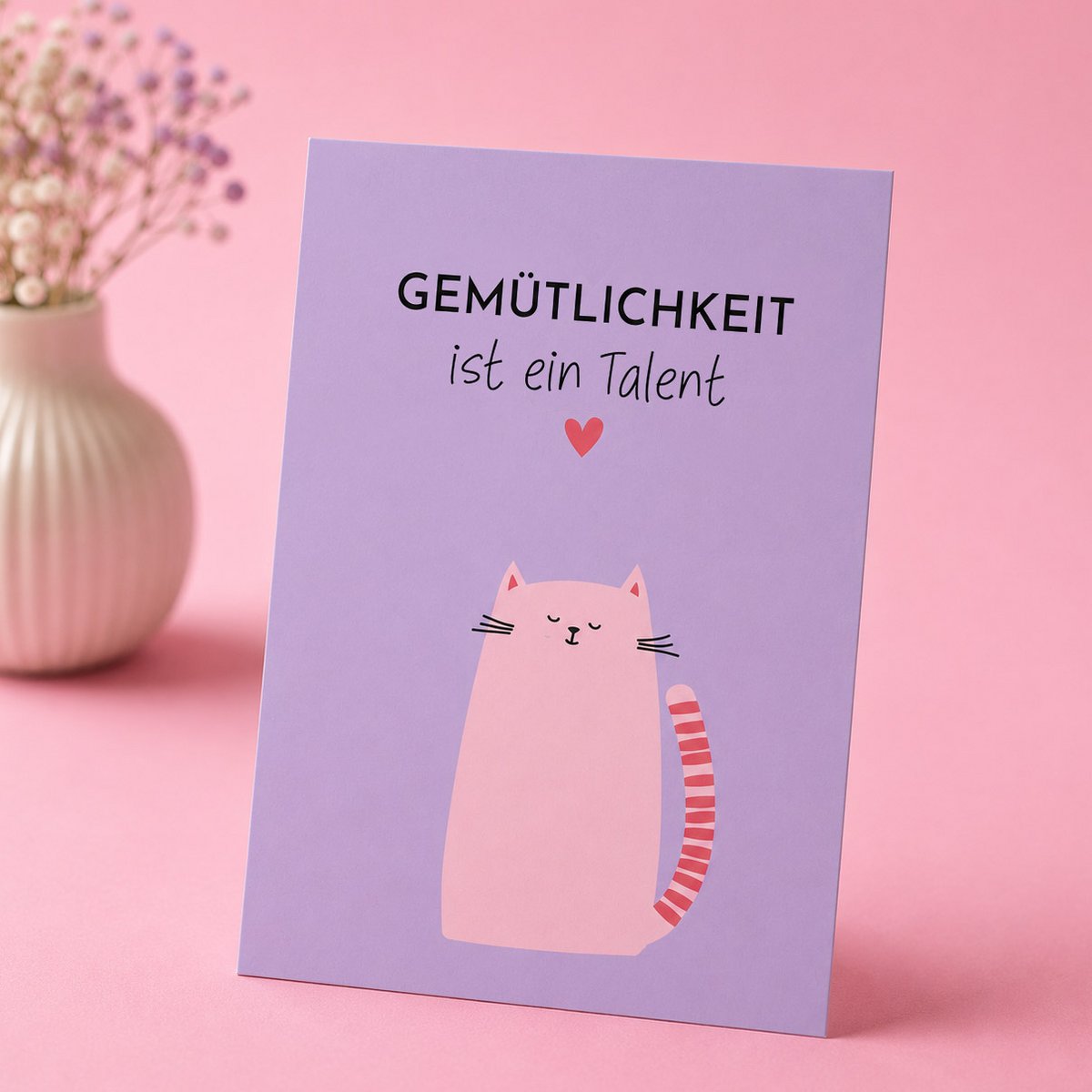Ansichtkaart met de spreuk “Gezelligheid is een talent”