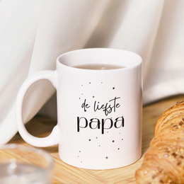 Boho-style mug with affirmation text "never stop dreaming" and floral print design. Ceramic material, suitable for hot beverages.