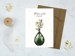 A Christmas card with a hand-drawn illustration of a green glass vase containing a floral arrangement. The card is titled "Christmas Joy" and has a simple, elegant design.