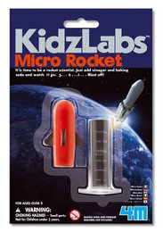 A small, red and white plastic rocket toy with a clear plastic body, designed for educational and creative play.