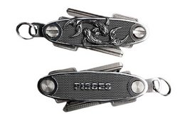 Black metal key organizer with fish design and "ASTROWERK 03 FISH" text.
