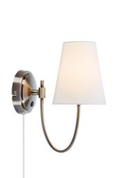  Wall light with off-white shade and antique brass finish.