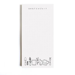 A white notepad with a garden-themed illustration on the cover, featuring various gardening tools and icons. The notepad is titled "Garden Time" and is categorized as a stationery product.