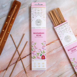 "Bulgarian Rose Natural Incense Stick/Agarbatti | No charcoal - Floral, aromatic incense sticks made from natural ingredients without charcoal."
The image shows a set of incense sticks in various floral and herbal scents, including Bulgarian Rose. The incense sticks are packaged in boxes with floral designs, indicating the natural, botanical ingredients used to make them. Based on the product title and category, these appear to be natural, charcoal-free incense sticks that would be suitable for aromatherapy or home fragrance.