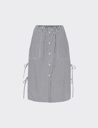  Navy blue long-sleeved top with tie detailing, paired with a striped midi skirt.