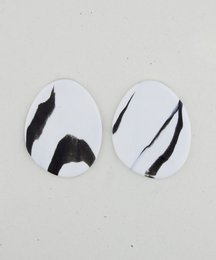 Small drop earrings with a black and white abstract pattern design.