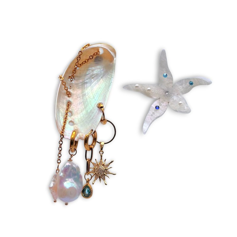 Thalassa oorbellen – asymmetrische schelp- en zeesteroorbellen
