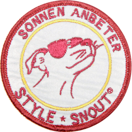 Colorful sticker patch with sunbather design, suitable for pet collars. Features a round, compact shape.