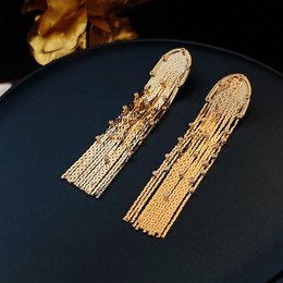 Pendientes largos con borlas brillantes