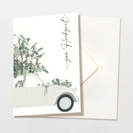 Folded wedding card with envelope, featuring a floral bouquet design in green and white. The card is FSC certified, indicating it is made from sustainable materials.