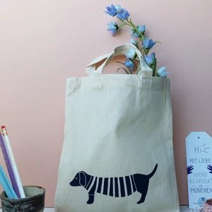 Small fabric bag with natural dachshund motif