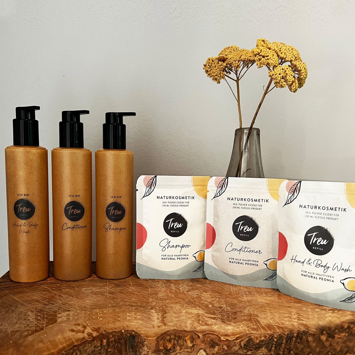 Startset biologische shampoo, conditioner, hand & body wash inclusief navulflessen van vloeibaar hout