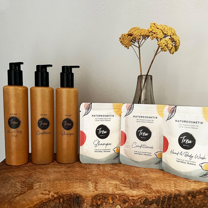 Startsæt økologisk shampoo, balsam, hånd- og kropsvask inklusive genopfyldningsflasker lavet af flydende træ