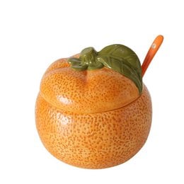 A round, orange storage jar made of dolomite material with a green leaf accent on the lid.