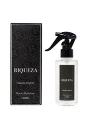 A room perfume with a floral and woody scent, featuring notes of jasmine, sandalwood, and amber. The sleek black bottle with a spray nozzle allows for easy application.
