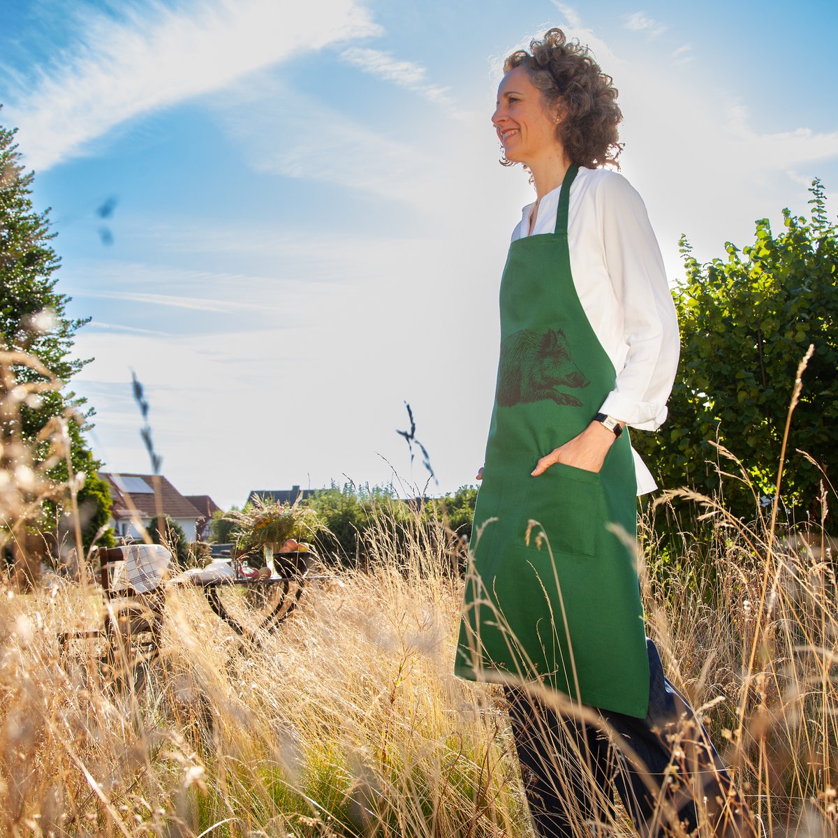 Green cooking apron with wild boar