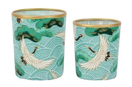 Decorative tealight holders featuring a nature-inspired design with cranes and waves in shades of green and gold.