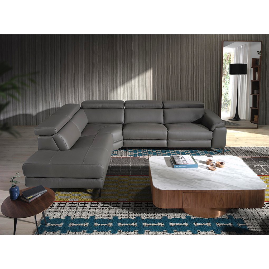 Corner sofa upholstered in gray leather