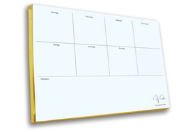 Weekly planner with gold trim, featuring a clean, minimalist design and grid layout for organizing your schedule.