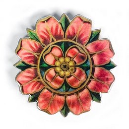  Decorative brooch with a vibrant floral design in shades of pink and yellow. The brooch features a round, layered flower shape with petals and a central stamen. The brooch has a metallic finish and the brand name "VOGLIO BENE" is visible on the surface.