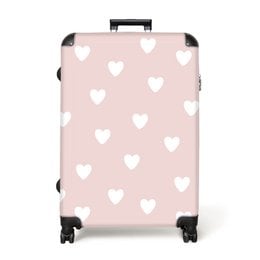 A light pink suitcase with a heart pattern, available in 3 sizes (62x83 cm, 53x72 cm, 45x61 cm). The suitcase has 4 wheels for easy mobility.