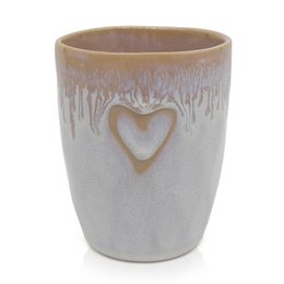  Stoneware mug with heart-shaped cutout in a pale gray and beige glaze.