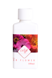 A floral, aromatic room spray with a blend of exotic flowers, including orchids. The spray features a vibrant, colorful design on the bottle.