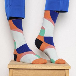 Pink and purple patterned socks with a textured design.
