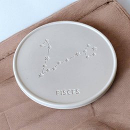 Round coasters featuring the Pisces zodiac sign constellation design, available in single piece or set of 4 or 6 pieces.