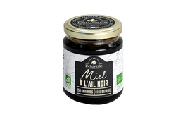 Organic black garlic honey, a unique and flavorful honey product made from black garlic. Features a rich, savory-sweet taste.
