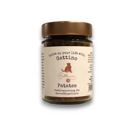 Harissa spice mixture, a blend of chili peppers, garlic, cumin, and other spices, with a vibrant orange-red color and a complex, aromatic flavor profile.