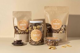 Organic granola with dark banana flavor, available in 750g bag or jar. Made with high-quality ingredients, this granola is a healthy and delicious breakfast or snack option.