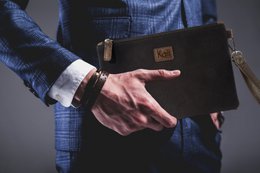 K0027AB | Wrist Pouch in Canvas/Genuine Full Grain Volanata Leather - Color Black/Dark Brown - Polished Nickel Accessories. Dimensions: 25.5 x 17.5 x 1 cm - Packaging: Tnt bag