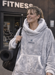 Gray hooded poncho, soft fleece, kangaroo pocket, post-sport recovery wear, unisex universal size