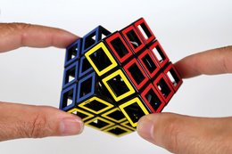 Hollow cube puzzle game with colorful cube design, suitable for strategic thinking and problem-solving.