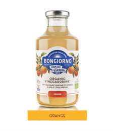 Orange 500 ml juice bottle with fresh orange fruit and leaves