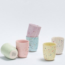 A set of 6 colorful, patterned cups in pastel shades of pink, green, and blue. The cups appear to be made of ceramic or porcelain and have a speckled or dotted design. The cups are presented in a gift box with the product title "New Party Medium Cup 220ml - Mix 6 Pieces".