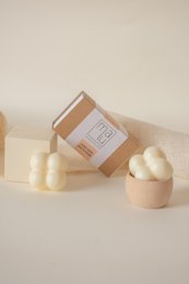 Solid face cream for oily skin. Cream-colored, round, and packaged in a box.