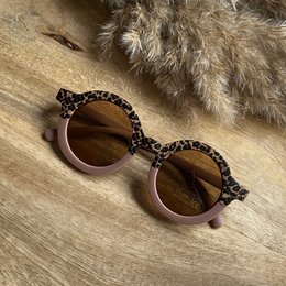 Pink sunglasses with a half tiger print design and rhinestone accents, suitable for kids.