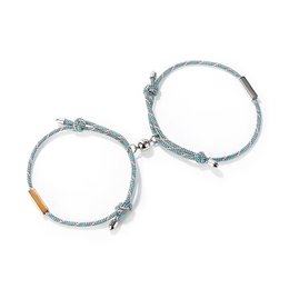 A set of two friendship bracelets with magnets. The bracelets feature a braided design in a light blue or gray color, with metal accents.
