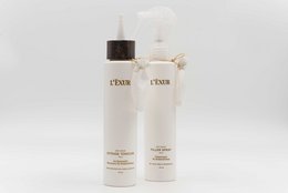 "Anti Hair Loss Duo - Intense Tonicum and Filler Spray for light hair. Hair care products for hair loss treatment."
The image shows two bottles of hair care products labeled "Anti Hair Loss" Duo - Intense Tonicum PO/1 and Filler Spray PO/2. The products are designed for light hair and are part of a hair loss treatment system.