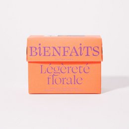 Orange floral-scented tea with slimming properties. Rectangular bar soap with floral design.